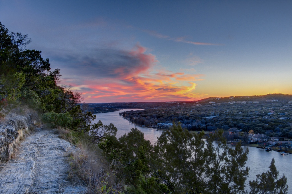 The 102 steps to the top of Mount Bonnell are worth the climb. Visitors are rewarded breathtaking, panoramic views of the city below like this one.